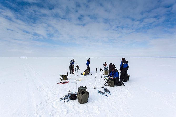 Arctic Day with Ice Fishing and Floating - A 6.5-hour Arctic sampler in Rovaniemi