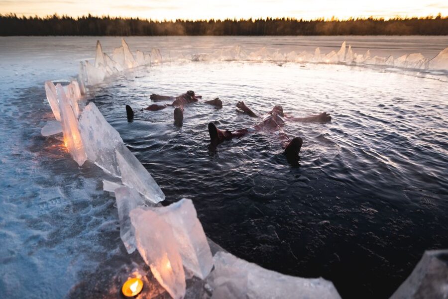 Daytime Ice Floating Rovaniemi, Frozen Lake Experience - Warming up at the cottage, open fire, cookies, and the useful info