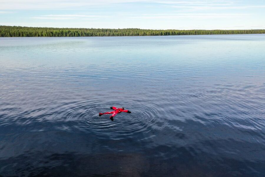 From Rovaniemi: Midnight Sun Forest Lake Float - Suit Up Like a Pro, Comfort Tips Before You Hit the Water