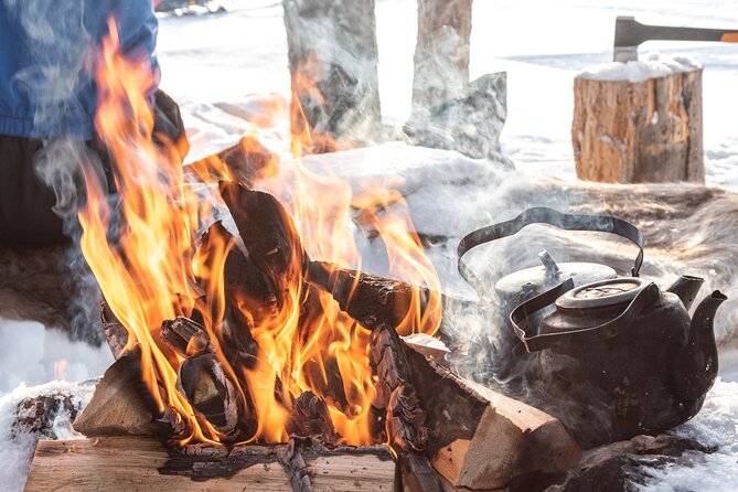 Hike to Frozen Waterfalls of Korouoma Including BBQ Lunch from Rovaniemi - BBQ lunch by the fire and blueberry tea: what you get to eat