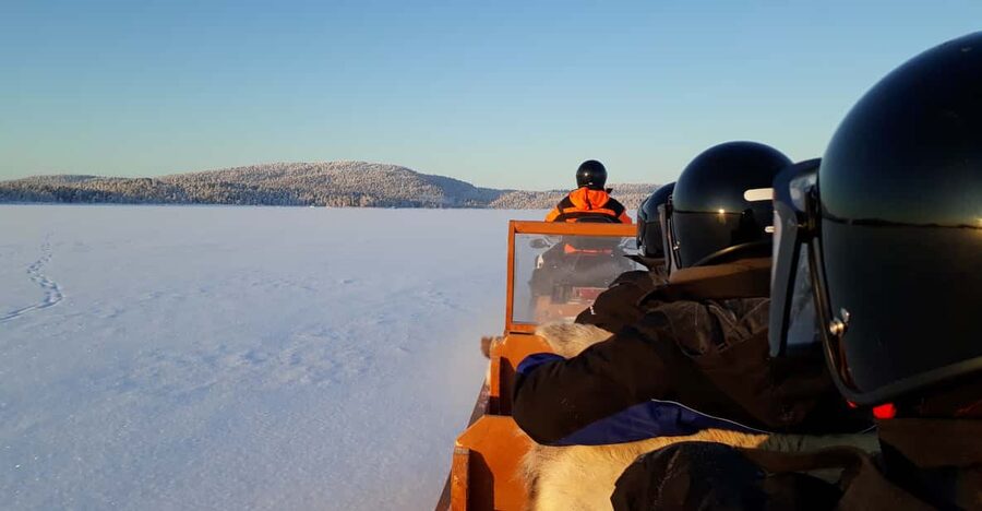 Ivalo: Ice Fishing Tour to Lake Inari, Reindeers & Lunch - The sleigh ride to the secret fishing spot