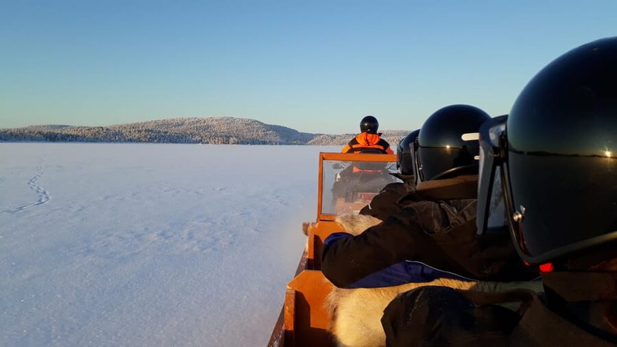 Ivalo: Ice Fishing Tour to Lake Inari, Reindeers & Lunch - From Ivalo pickup to Koppelo, you get set up properly for the cold