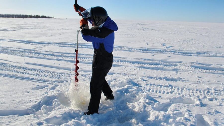 Kemi-Tornio: Ice Fishing Safari with Snowmobiles - Warm winter clothing and a safety briefing that keeps it smooth