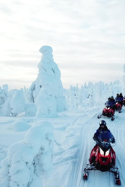 King of Ylläs: Snowmobiling to the Hill - The climb to the top: 25 km of winter riding toward Sweden views