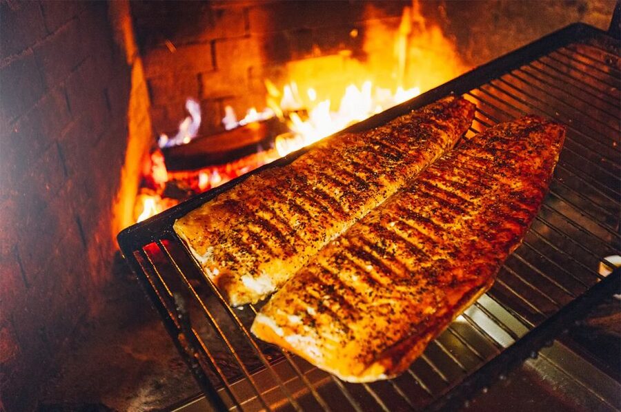 Lapland: Ice Fishing, Floating & BBQ Snow Adventure - The Lapland BBQ pause: salmon, bread, marshmallow, hot drinks