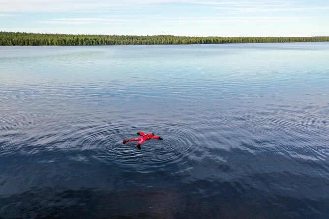 Midnight Sun Floating Experience in Forest Lake - The floating survival suit, sizing rules, and comfort tips