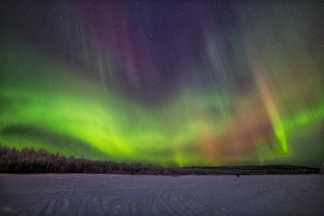 Northern Lights Hunting with Snowmobiles - Your Guide and the Small Group Advantage