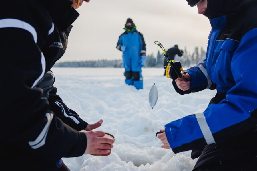 Rovaniemi: Arctic Circle Ice Fishing Experience - The campfire break on a frozen lake