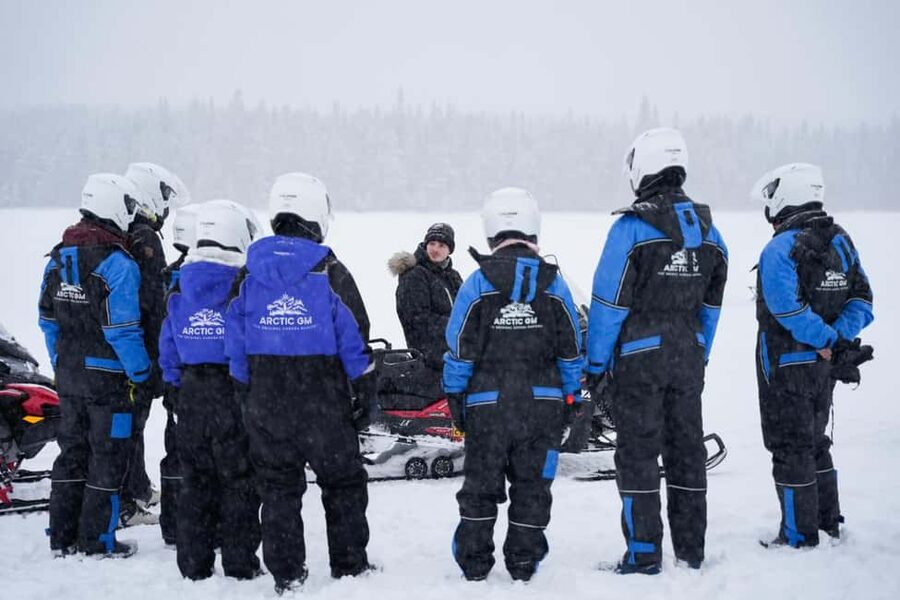 Rovaniemi: Guided Wilderness Snowmobile Safari & Barbeque - The fire-side break: hot drinks, cabin warmth, and BBQ sausages