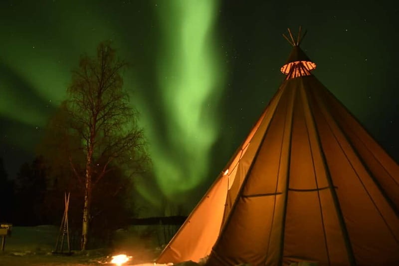 Rovaniemi: Snowtrain to Northern Lights Camp - Arrival at Camp: Bonfire, Warm Drinks, and Arctic Stories