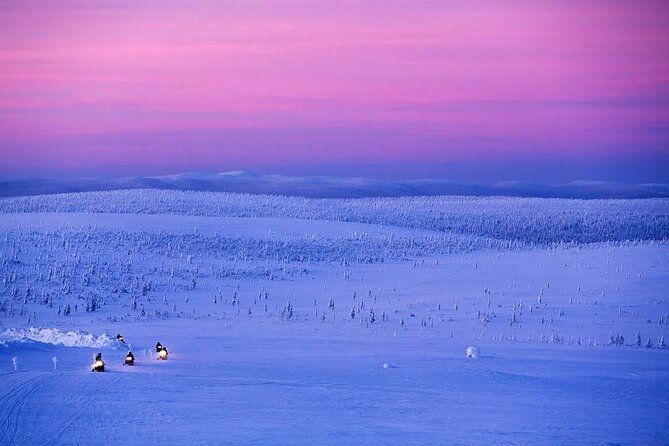 Snowmobile and Ice Fishing Experience - Snowmobile ride in Lapland: what the forest timing feels like
