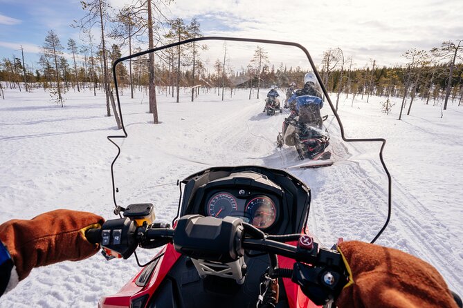 Snowmobile Safari into the Wilderness, Apukka Resort Rovaniemi - Getting On the Snowmobile: First-Timers and Kids